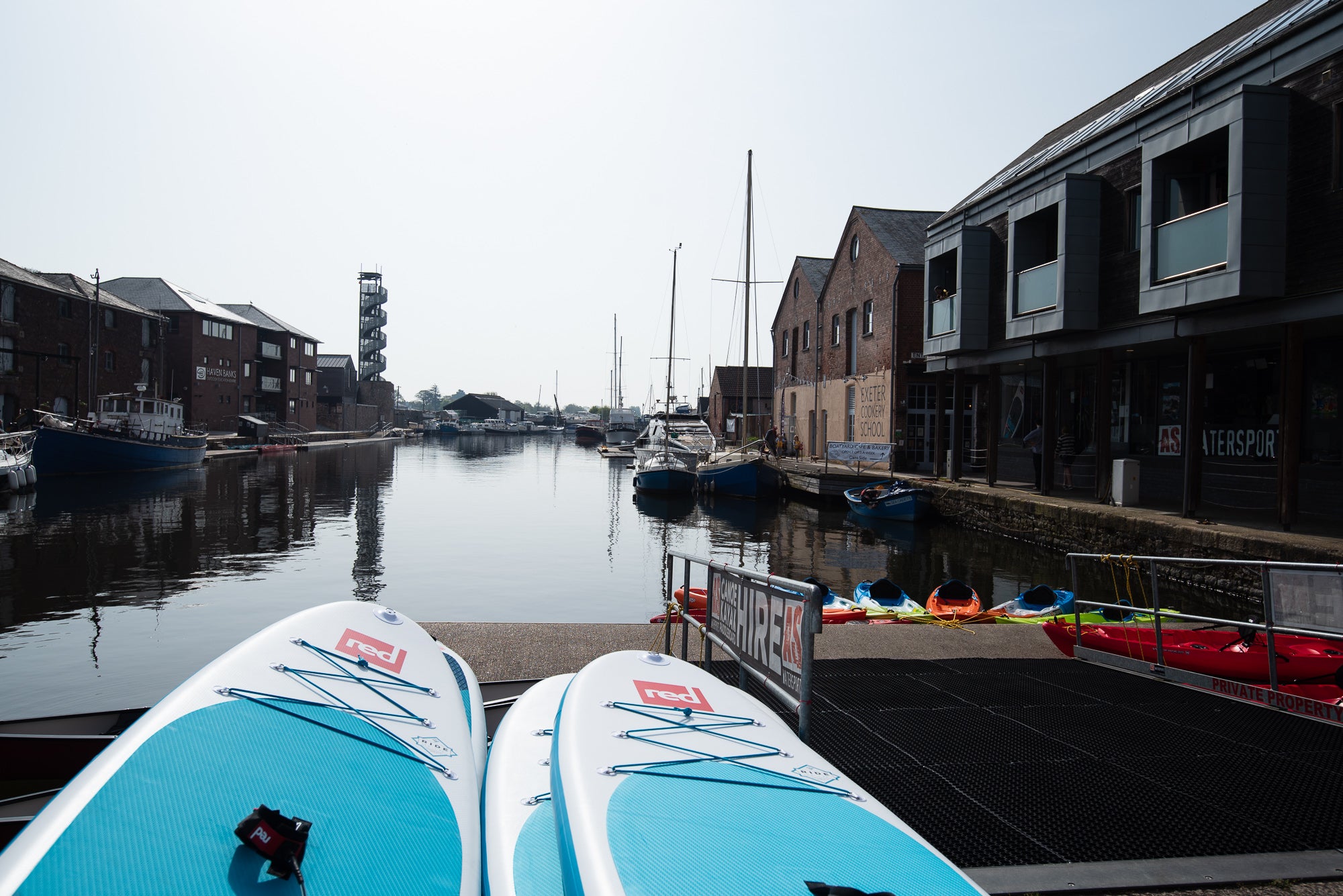 Showing Red Paddle Co paddleboards ready to be tested on the water